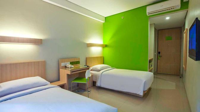 Kombinasi warna kamar tidur hijau dan putih dalam hunian karya KsAD. (dok.Arsitag.com/Dinny Mutiah)