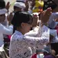 Galungan (Foto: SONNY TUMBELAKA / AFP)