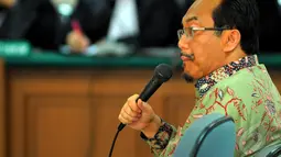 Uang yang diterima Suswono saat ia menjabat sebagai anggota DPR dan uang itu telah diserahkan ke KPK, Pengadilan Tipikor, Jakarta, Rabu (4/6/2014) (Liputan6.com/Faisal R Syam).