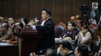 Ketua Kuasa Hukum KPU untuk Pilpres, Ali Nurdin memberikan keterangan dalam sidang sengketa Pilpres 2019 di Gedung MK, Jakarta, Selasa (18/6/2019). Sidang tersebut beragendakan mendengarkan jawaban dari termohon. (Liputan6.com/Faizal Fanani)