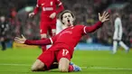 Pemain Liverpool, Curtis Jones melakukan selebrasi setelah mencetak gol ke gawang West Ham United pada laga perempat final Carabao Cup 2023/2024 di Anfield, Liverpool, Inggris, Kamis (21/12/2023) dini hari WIB. (AP Photo/Jon Super)
