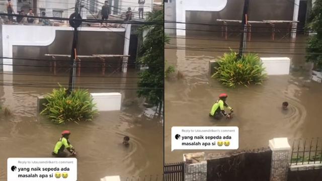 Aksi Pria Naik Sepeda saat Banjir Ini Kocak Sekaligus Bikin Geleng Kepala