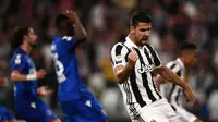 Gelandang Juventus, Sami Khedira, turut mencetak gol saat timnya menang 3-1 atas Bologna pada laga pekan ke-36 Serie A di Allianz Stadium, Sabtu (5/5/2018) waktu setempat. (AFP/MARCO BERTORELLO)