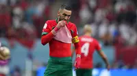 Pemain Maroko, Hakim Ziyech saat laga semifinal Piala Dunia 2022 melawan Prancis yang berlangsung di Al Bayt Stadium, Qatar, Rabu (14/12/2022). (AP Photo/Natacha Pisarenko)