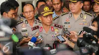 Irjen Tito Karnavian saat ditanya wartawan usai rapat dengan Basuki T Purnama di Balaikota, Jakarta, Senin (15/6/2015). Rapat Forkopimda diadakan untuk menyikapi perkembangan Kamtibmas menjelang bulan suci ramadan 1436 H. (Liputan6.com/Faizal Fanani)