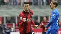 Winger AC Milan, Christian Pulisic, berhasil mencetak gol tunggal kemenangan timnya atas Empoli pada laga pekan ke-28 Serie A di San Siro, Minggu (10/3/2024) malam WIB.&nbsp;(AP Photo/Luca Bruno)