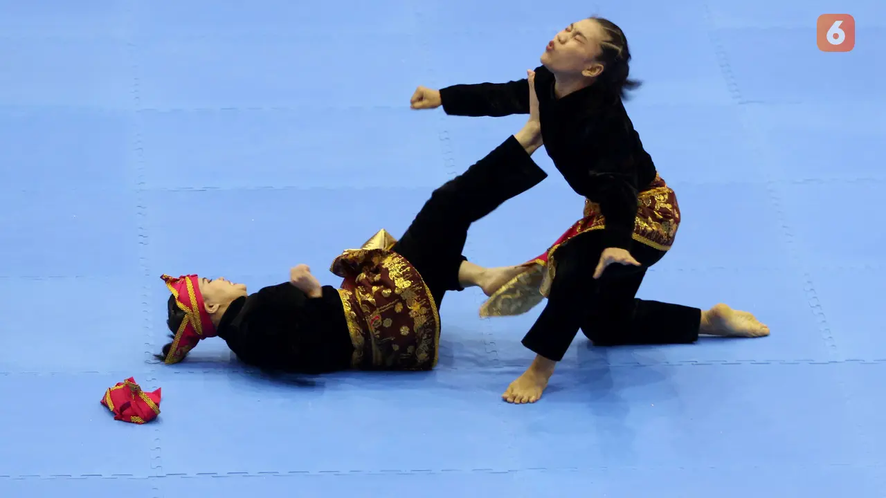 Foto: Riska Hermawan dan Ririn Rinasih Tak Terbendung, Pencak Silat Sumbang Medali Emas SEA Games 2021