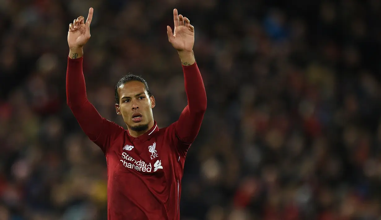 1. Virgil van Dijk (80 juta euro) - Bek berusia 29 tahun ini menjadi pemain asal Belanda yang memiliki harga transfer termahal. Pemain berseragam Liverpool ini memiliki value transfer 80 juta euro saat ini. (AFP/Oli Scarff)