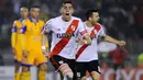 Ramiro Funes Mori merayakan gol yang dicetaknya pada laga Piala Libertadores di Buenos Aires, Rabu (5/8/2015). Bek berkebangsaan Argentina itu diperkirakan akan menjalani debut bersama Everton pekan ini. (AFP Photo/Charly Diaz Azcue)