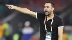 Xavi Hernandez - Legenda Barcelona ini sudah sejak lama diinginkan manajemen Blaugrana untuk mengisi kursi pelatih. Sejauh ini, prestasi Xavi sebagai pelatih juga cukup mentereng yakni dengan mempersembahkan empat trofi untuk Al Sadd. (AFP/Karim Jaafar)