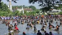 Melihat Keseruan Lebaran Depok: Ratusan Warga hingga Anggota DPRD Ngubek Empang