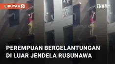 Seorang perempuan bergelantungan di luar jendela sebuah rusunawa mengundang perhatian