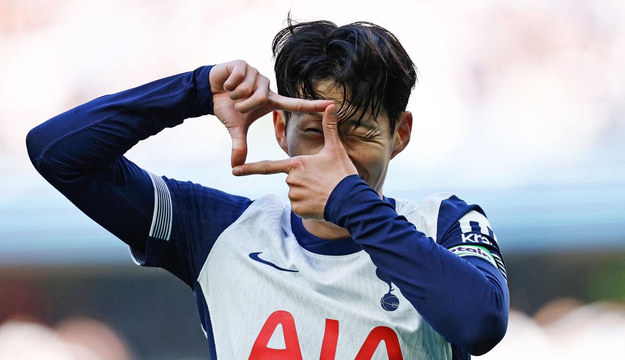 Selebrasi khas Son Heung-min yang akan selalu dirindukan fans Tottenham Hotspur. (AFP/Benyamin Cremel)