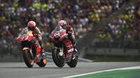 Andrea Dovizioso mengaku, kunci mengalahkan Marc Marquez pada MotoGP Austria terletak pada keberanian di tikungan terakhir. (AFP/Vladimir Simicek)