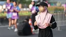 Aktivitas olahraga warga tetap berlangsung di kawasan Car Free Day (CFD) Jakarta saat kualitas udara menjadi perhatian akibat sebaran abu vulkanik, Minggu (6/9/2026). (KLY/Budy Santoso)
