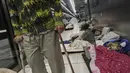 Hingga saat ini, pemerintah Israel mencatat sedikitnya 24 orang tewas dan ratusan lainnya luka-luka akibat serangan Iran. (AP Photo/Oded Balilty)