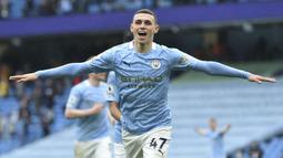Phil Foden merupakan talenta muda yang berhasil bersinar berkat didikan Pep Guardiola. Pemuda 21 tersebut adalah seorang playmaker dengan kemampuan passing, dribbling, kecerdasan, dan visi yang sangat bagus. Tahun ini, ia sudah masuk ke dalam nominasi 30 besar peraih Ballon d'Or. (AFP/Peter Powell)