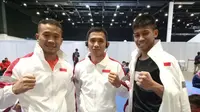 Atlet wushu Indonesia yang akan berlaga pada final Sanda putra SEA Games 2019, yaitu Laksamana Pandu, Ade Permana dan Yusuf Widiyanto. (dok. KONI)