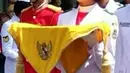 Maria Felicia Gunawan adalah anggota pasukan Pengibar Bendera Pusaka Asal banten, tepatnya Cia pembawa baki yang di tunjuk oleh Presiden Republik Indonesia Joko Widodo. (Via Insagram/@Mariafelicia23)