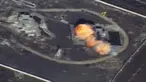 Sebuah gambar yang diambil dari rekaman video drone yang dirilis Kementerian Pertahanan Rusia pada 17 November 2016, memperlihatkan kepulan api saat rudal menghantam markas ISIS di lokasi yang tidak diketahui di Suriah. (Reuters)