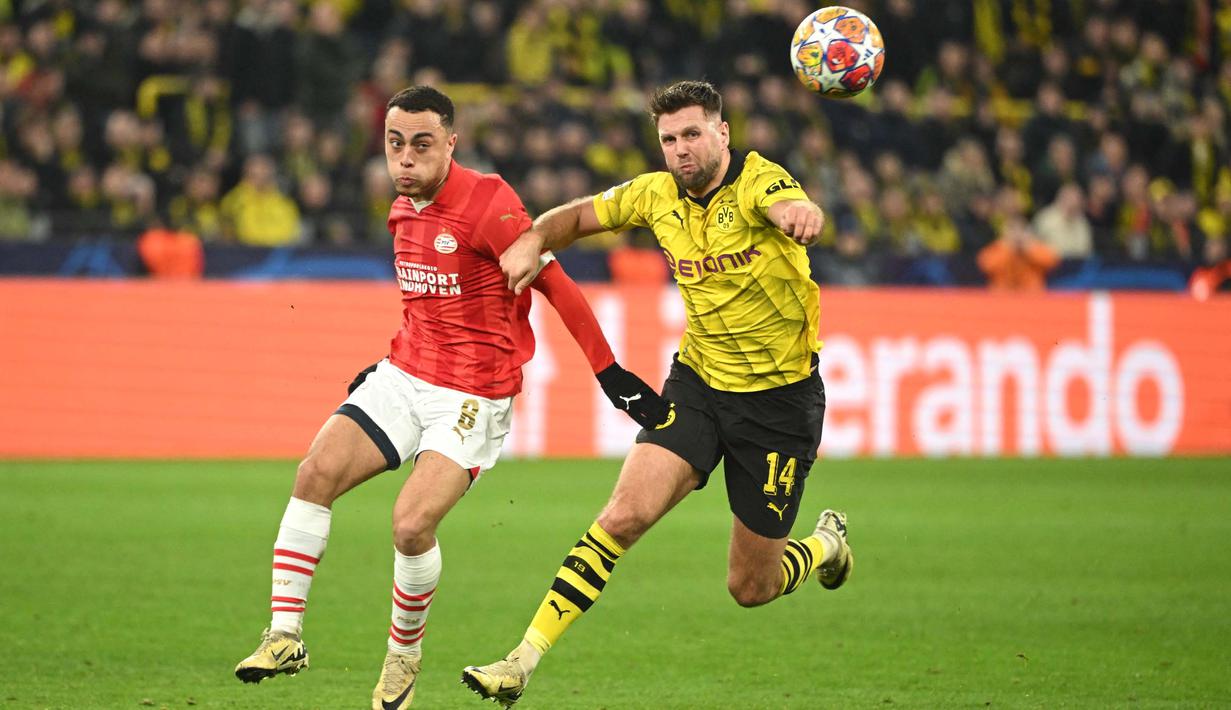 Kemenangan ini membuat Die Borussen unggul agregat gol 3-1 setelah kedua tim bermain imbang 1-1 pada leg pertama. (INA FASSBENDER/AFP)