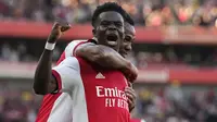 Bukayo Saka. Gelandang Arsenal berusia 20 tahun ini menyumbang 1 gol dan 1 assist dalam kemenangan 3-1 atas Tottenham Hotspur. Musim ini adalah musim keempatnya bersama The Gunners dan total telah bermain dalam 96 laga di semua kompetisi dengan mencetak 13 gol. (AP/Frank Augstein)