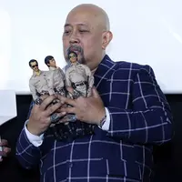 Indro Warkop menghadiri gala premier Warkop DKI Reborn (Nurwahyunan/Bintang.com)