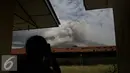 Gunung Sinabung di Kabupaten Karo, Provinsi Sumatera Utara, pada Idul Fitri 1436 Hijriah masih terus menyemburkan debu vulkanik dan luncuran awan panas yang sangat berbahayakan bagi warga di daerah itu. (Liputan6.com/Johan Tallo)