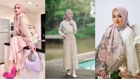 Gamis warna pastel polos paling pas dipadukan dengan hijab segi empat bermotif floral seperti Cindy Fatika Sari ini. [Instagram/cindyfatikasari18]