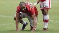 Striker Persija, Bruno Lopes, melakukan selebrasi unik dengan merangkak usai mencetak gol ke gawang Persegres pada laga Liga 1 Indonesia di Stadion Patriot, Bekasi, Sabtu (14/10/2017). Persija menang 5-0 atas Persegres. (Bola.com/M Iqbal Ichsan)