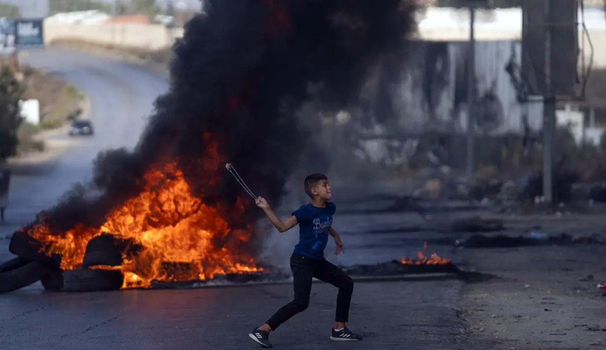 Baku tembak sengit dilaporkan terjadi di permukiman Israel dekat Jenin dan di Nablus ketika ketegangan terjadi. (AP Photo/Nasser Nasser)