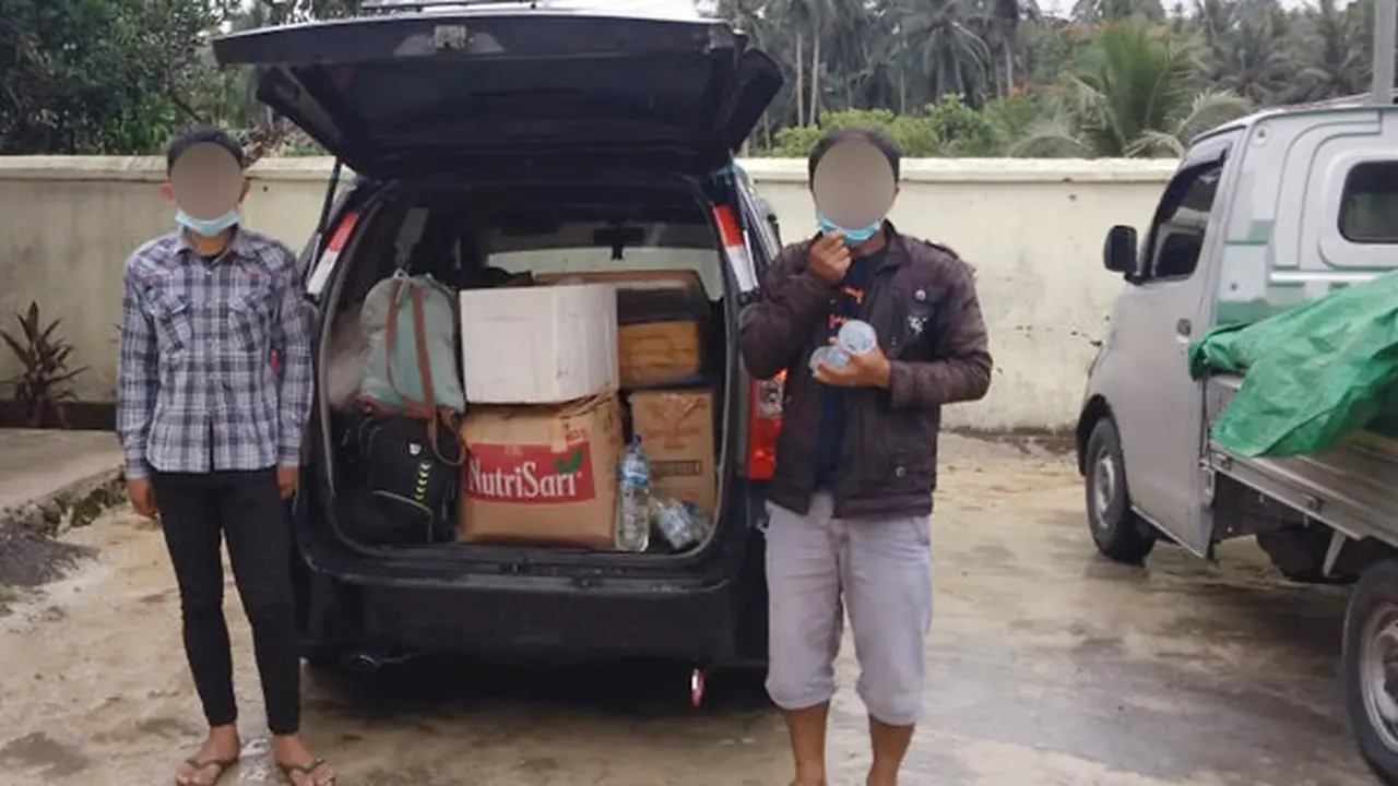 Pelaku dan barang bukti berupa ratusan liter miras jenis Cap Tikus diamankan Polres Bolmong.
