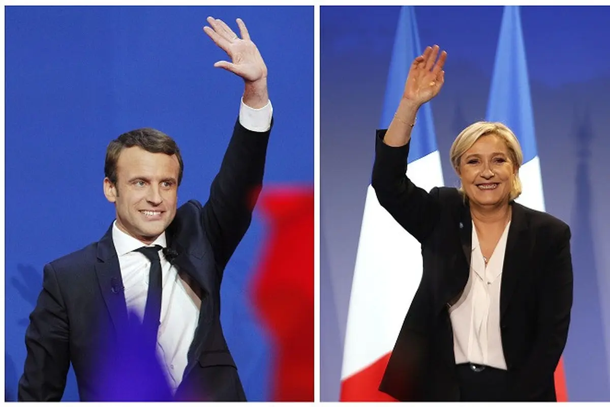 Dua kandidat kuat Pilpres Prancis 2017, Emmanuel Macron dan Marine Le Pen (Christophe Ena & Bob Edne/AP)