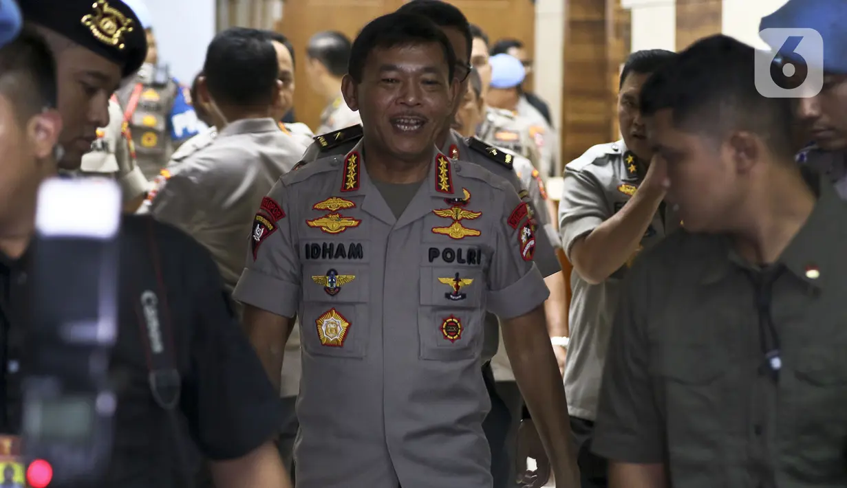 Kapolri Jenderal Polisi Idham Azis usai rapat kerja perdana dengan Komisi III DPR di Kompleks Parlemen, Jakarta, Kamis (30/1/2020). Rapat membahas Rencana Kerja 2020, Tindak lanjut kasus Novel Baswedan, Penanganan Kasus Natuna, Penanganan Kasus Taman Sari dan isu lainnya.(Liputan6.com/Johan Tallo)