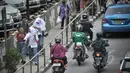 Kendaraan melintas di depan kawasan Ratu Plaza, Jakarta, Selasa (7/4/2015). Pemprov DKI bakal memperluas perlintasan pelarangan sepeda motor hingga Jalan Sudirman (Ratu Plaza) Jakarta Selatan. (Liputan6.com/Faizal Fanani)