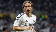 Hal tersebut terungkap pada 22 Mei 2025, Luka Modric mengatakan pada bahwa ia akan meninggalkan klub raksasa Spanyol itu. Tampak dalam foto, gelandang Real Madrid asal Kroasia, Luka Modric bereaksi selama pertandingan sepak bola final Piala Interkontinental FIFA 2024 melawan Pachuca dari Meksiko di Stadion Lusail, Doha, Qatar pada 18 Desember 2024. (KARIM JAAFAR/AFP)