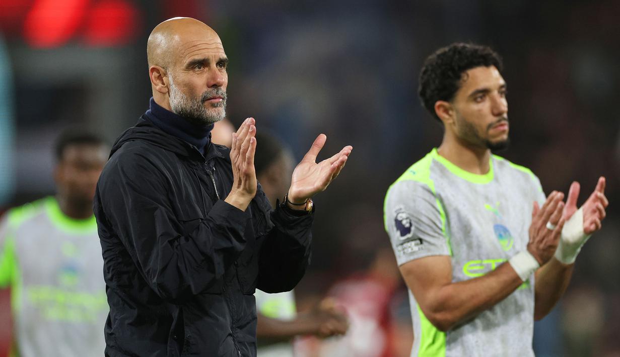Meski masih tersisa satu pertandingan di Liga Inggris, skuad asuhan Pep Guardiola tak akan mampu menyusul raihan poin Arsenal. Mereka terpaut empat poin di klasemen sementara. (AP Photo/Ian Walton)