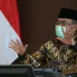 Menko PMK Muhadjir Effendy mengatakan perlu menyukseskan sosialisasi penggunaan masker khususnya masyarakat kelas menengah ke bawah saat rapat di Kantor Kemenko PMK, Selasa (25/8/2020). (Dok Kemenko PMK)