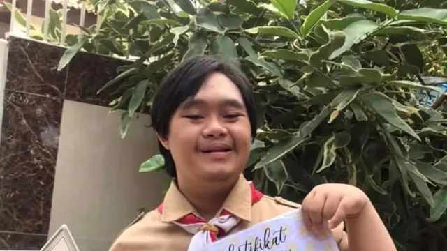 Ahmad Fikry penyandang down syndrome dari Jakarta Barat. Foto: Dokumentasi pribadi.
