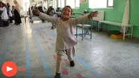 Viral video bocah menari bahagia dapat kaki palsu baru (Sumber: The Guardian)