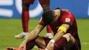 Cristiano Ronaldo tertunduk usai gagal membawa Portugal meraih poin penuh saat berlaga kontra Amerika Serikat di laga kedua penyisihan Piala Dunia 2014 Grup G di Stadion Amazonia, Brasil, (23/6/2014). (REUTERS/Jorge Silva)