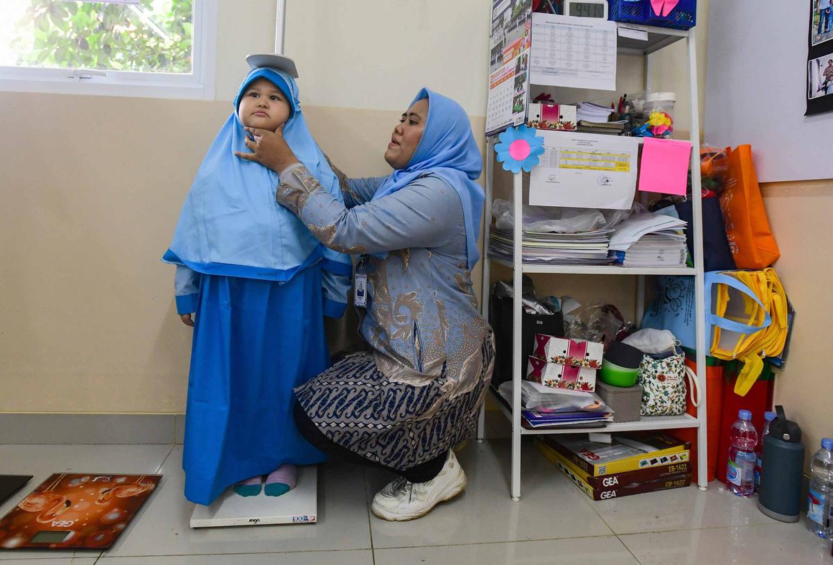FOTO:  Antusias Murid SD Ikuti Cek Pemeriksaan Gratis di Sekolah