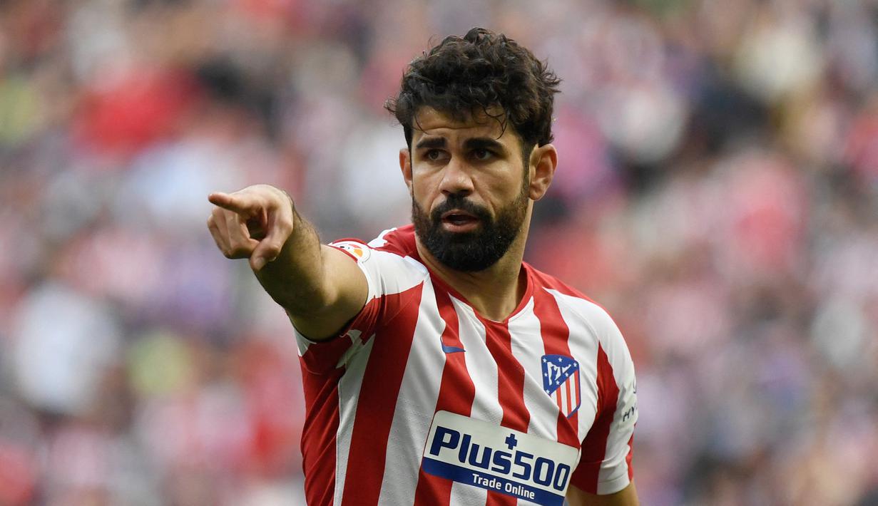 Reaksi striker Atletico Madrid, Diego Costa saat laga Liga Spanyol 2019/2020 menghadapi Sevilla di Wanda Metropolitano Stadium, Madrid (7/3/2020). Diego Costa membela Chelsea selama 3 musim mulai 2014/2015 hingga 2016/2017 usai didatangkan dari Atletico Madrid. Pada 2017/2018 Chelsea memulangkan Diego Costa ke Atletico Madrid dengan nilai transfer 60 juta euro. Saat ini Diego Costa berstatus tanpa klub setelah dilepas Wolverhampton pada akhir musim 2022/2023. (AFP/Pierre-Philippe Marcou)