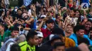 Massa pendukung Prabowo-Gibran saat melakukan aksi unjuk rasa di kawasan Patung Kuda, Jakarta Pusat, Jumat (19/4/2024). (Liputan6.com/Angga Yuniar)