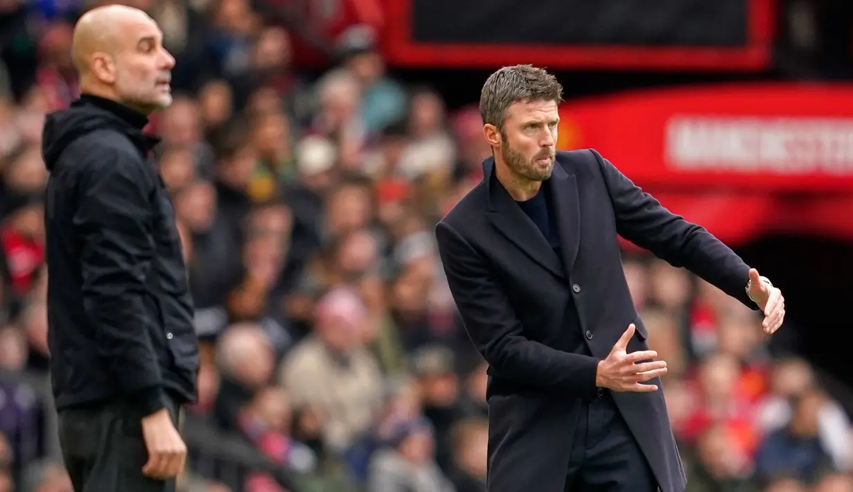 Seperti diketahui, Manchester United tengah terpuruk beberapa pekan terakhir. Puncaknya, mereka harus mengakhiri kerja sama dengan Ruben Amorim sebagai manajer. Posisi tersebut kini untuk sementara waktu diisi oleh Michael Carrick. (AP Photo/Dave Thompson)