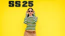 Hadiri Onitsuka Tiger SS25 di Milan Fashion Week, Maudy Ayunda tampil playful dengan baju bernuansa vibrant disertai kacamata hitam dengan gaya khas retro. [@maudyayunda]