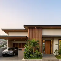 Kombinasi warna cat dengan aksen kayu untuk rumah minimalis. [AI Generated]