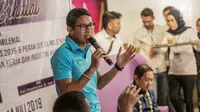 Sandiaga Uno saat berbicara dalam acara diskusi milenial di kawasan Jakarta, Minggu (14/7/2019). Diskusi bertema ‘Sikap Milenial Pasca Pilpres 2019 & Peran Serta Milenial dalam Menciptakan Lapangan Kerja dan Industri Kreatif’. (Liputan6.com/Faizal Fanani)