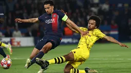 Dortmund berhasil membungkam tuan rumah PSG dengan skor 1-0. (Anne-Christine POUJOULAT / AFP)