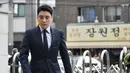 Mantan anggota boyband BIGBANG, Seungri yang memiliki nama asli Lee Seung Hyun tiba untuk menjalani interogasi di Kantor Polisi Metropolitan Seoul, Rabu (28/8/2019). Polisi memanggil Seungri untuk memberikan keterangan atas tuduhan kasus perjudian di luar negeri. (Jung Yeon-je / AFP)